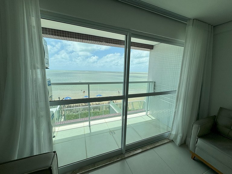 Lindo apartamento pé na areia