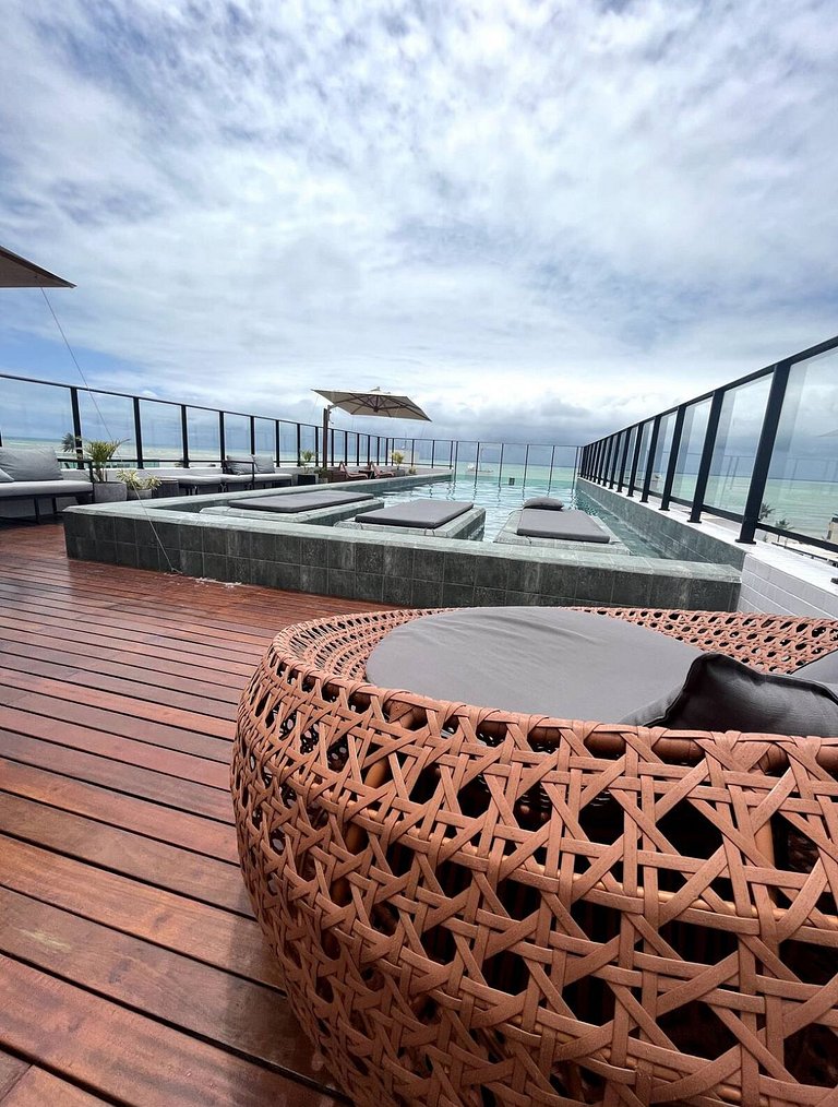 Studio estiloso com vista para o mar