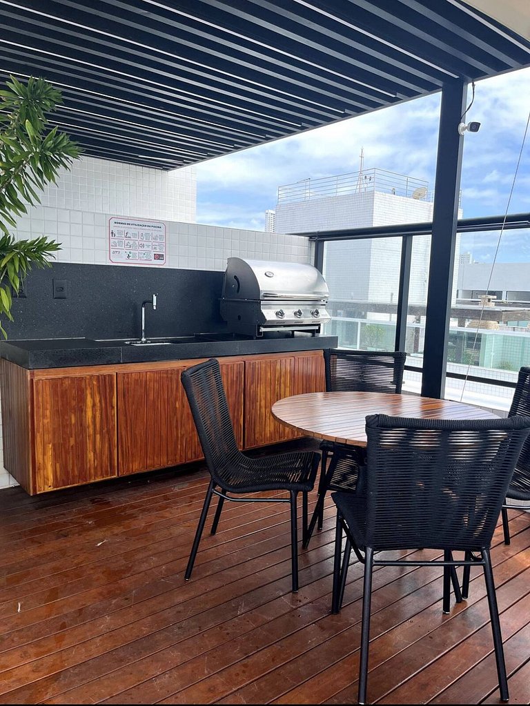 Studio estiloso com vista para o mar