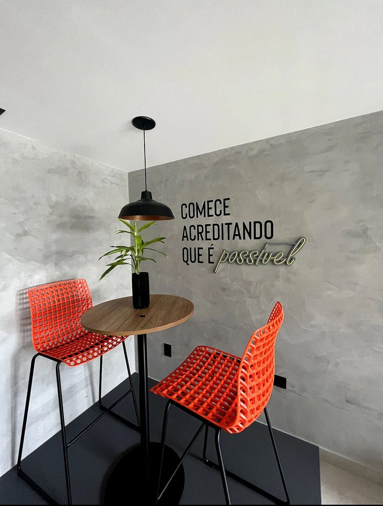Studio estiloso com vista para o mar