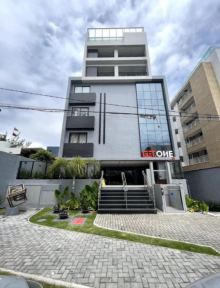 Studio estiloso com vista para o mar