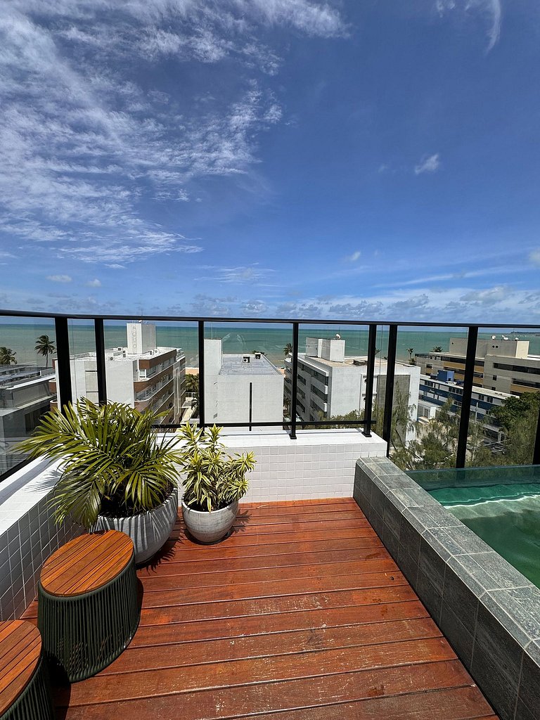 Studio estiloso com vista para o mar