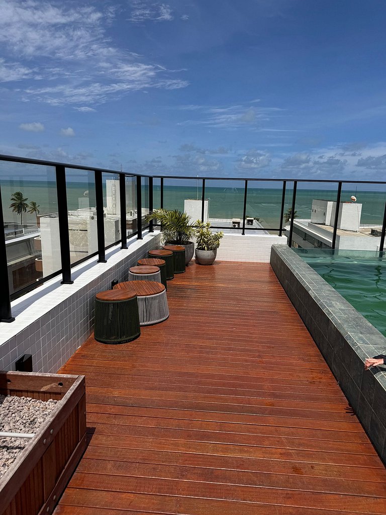 Studio estiloso com vista para o mar
