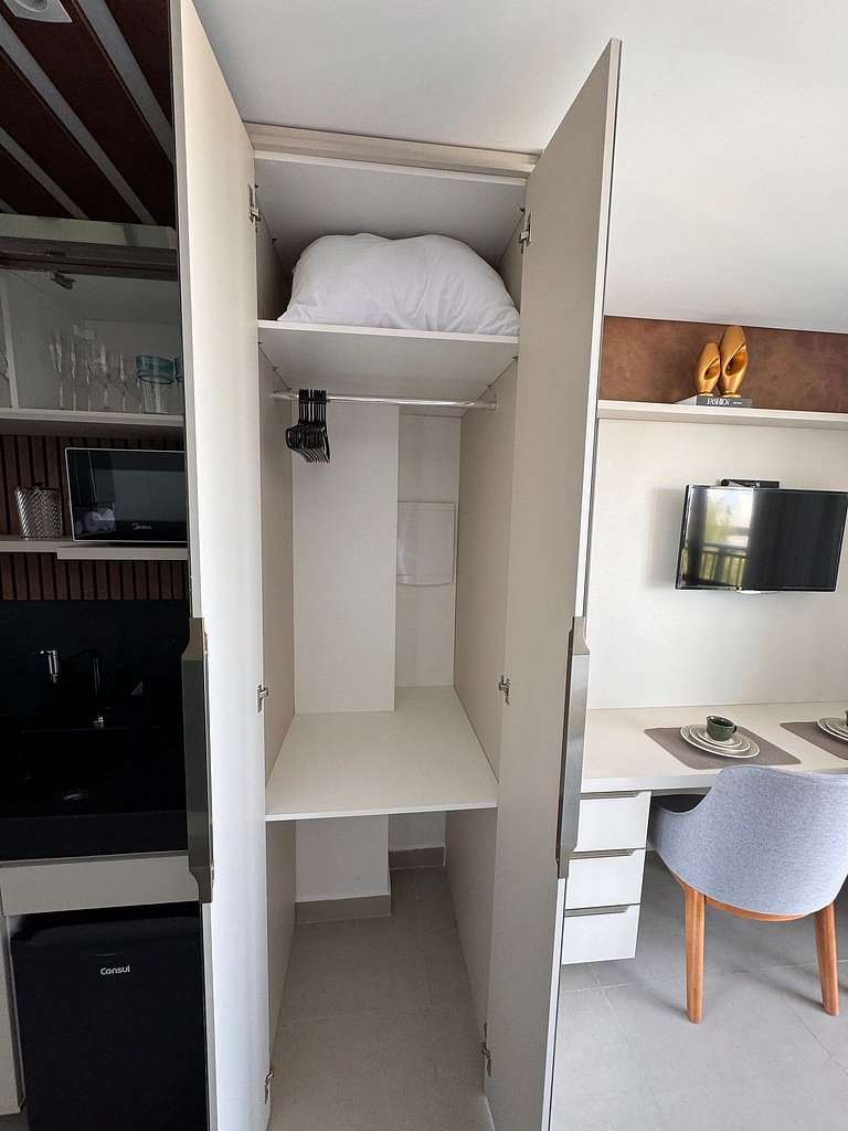 Studio estiloso com vista para o mar
