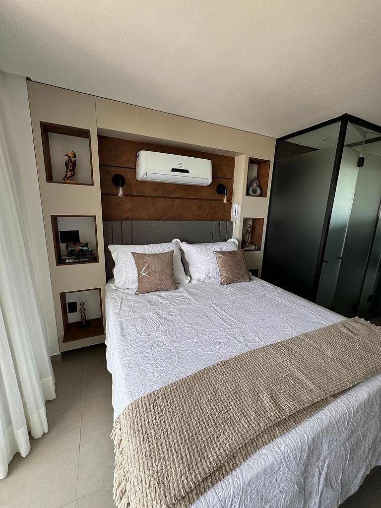 Studio estiloso com vista para o mar