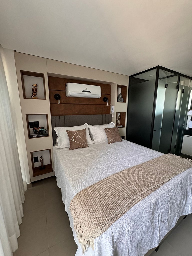 Studio estiloso com vista para o mar
