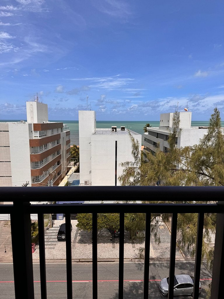 Studio estiloso com vista para o mar