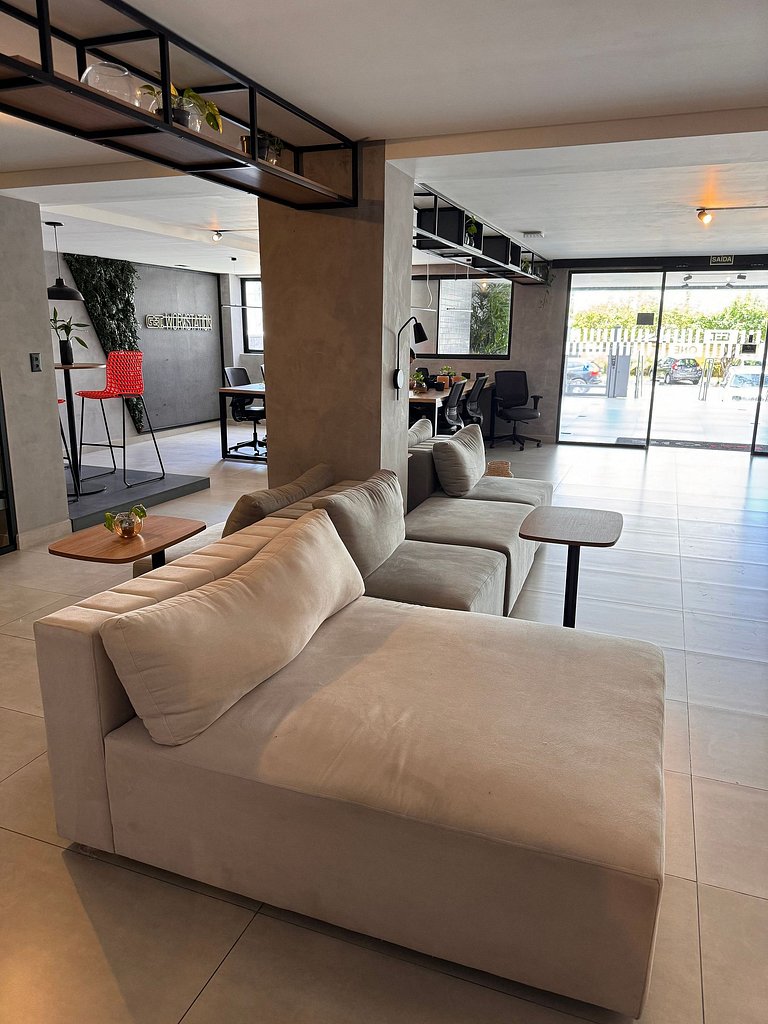 Studio estiloso com vista para o mar