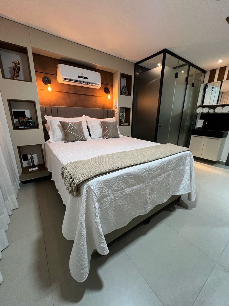 Studio estiloso com vista para o mar