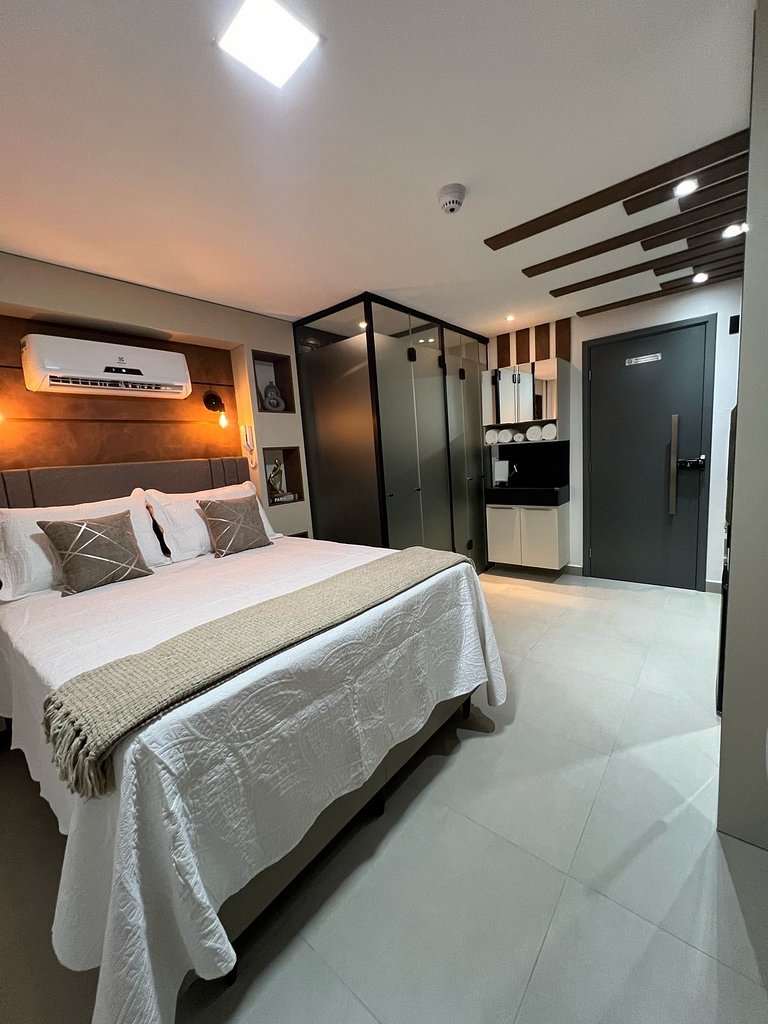 Studio estiloso com vista para o mar