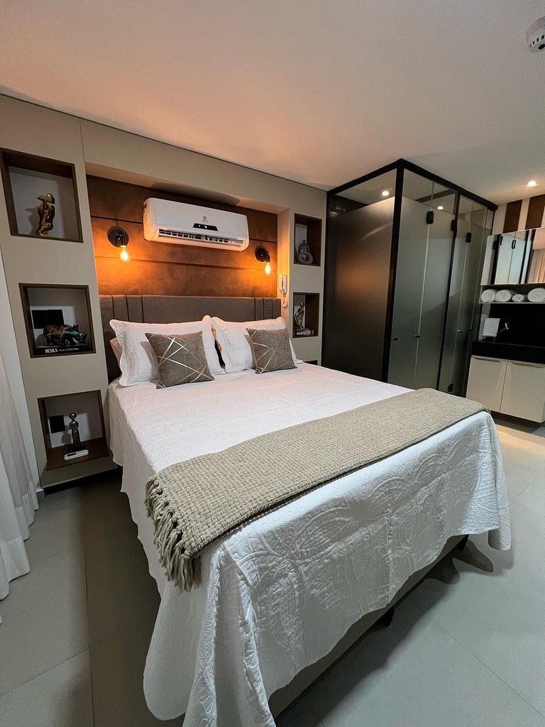 Studio estiloso com vista para o mar
